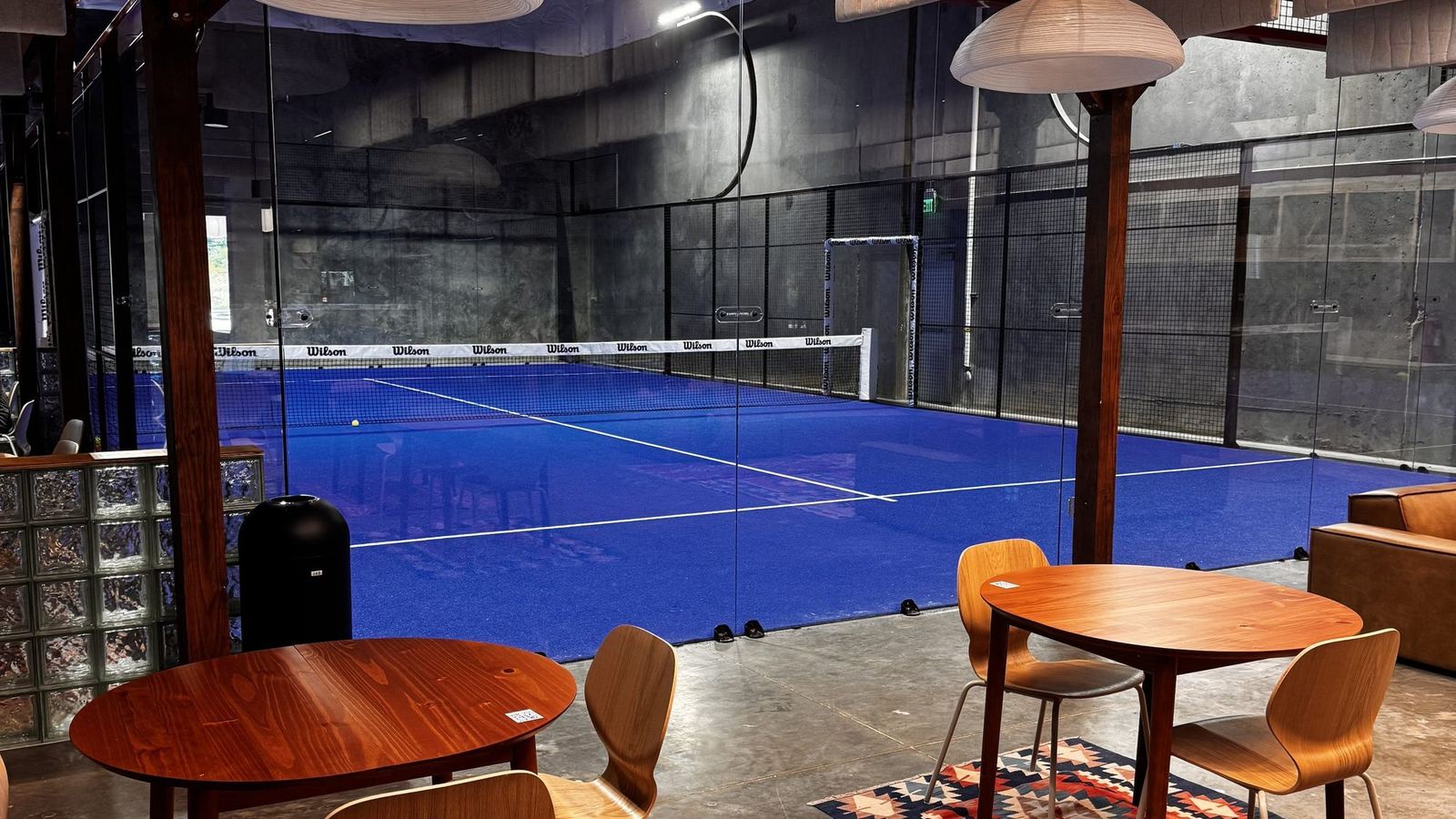 The lounge and indoor courts at Lobb's Padel in The Woodlands