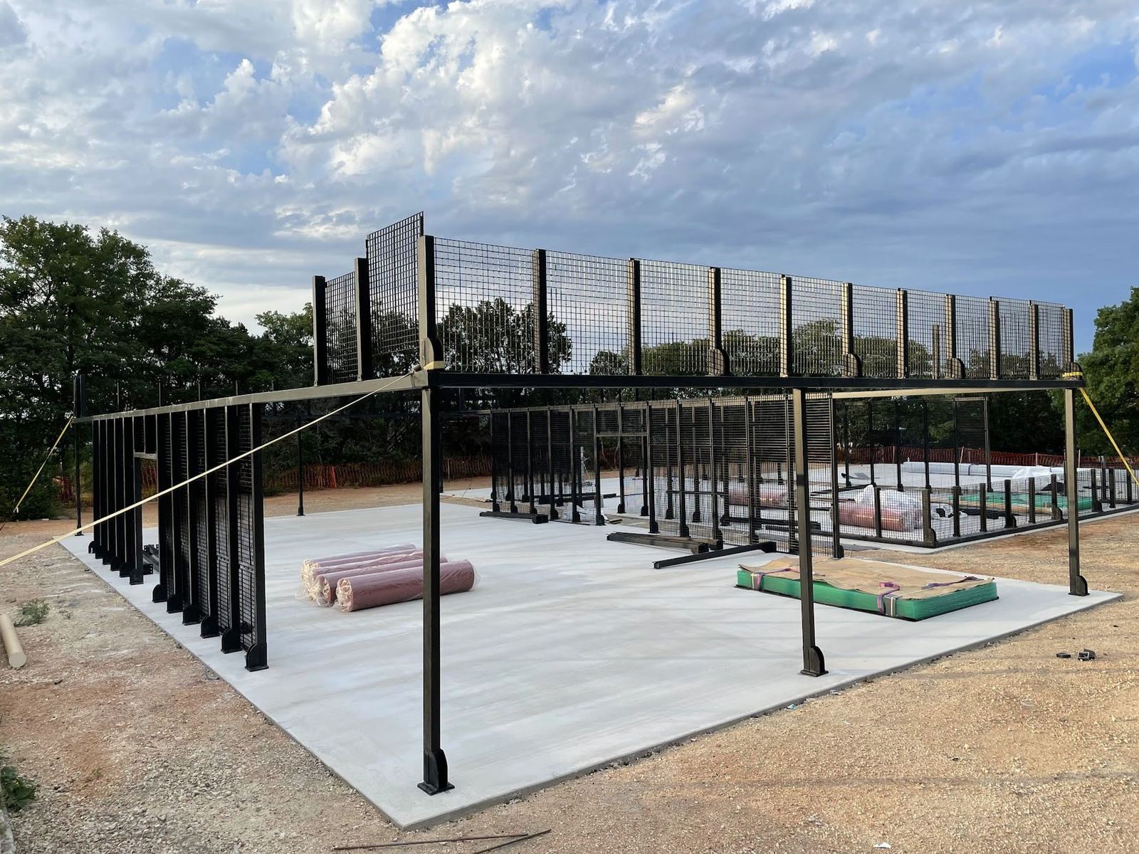 Court structure and glass going up on the new slab